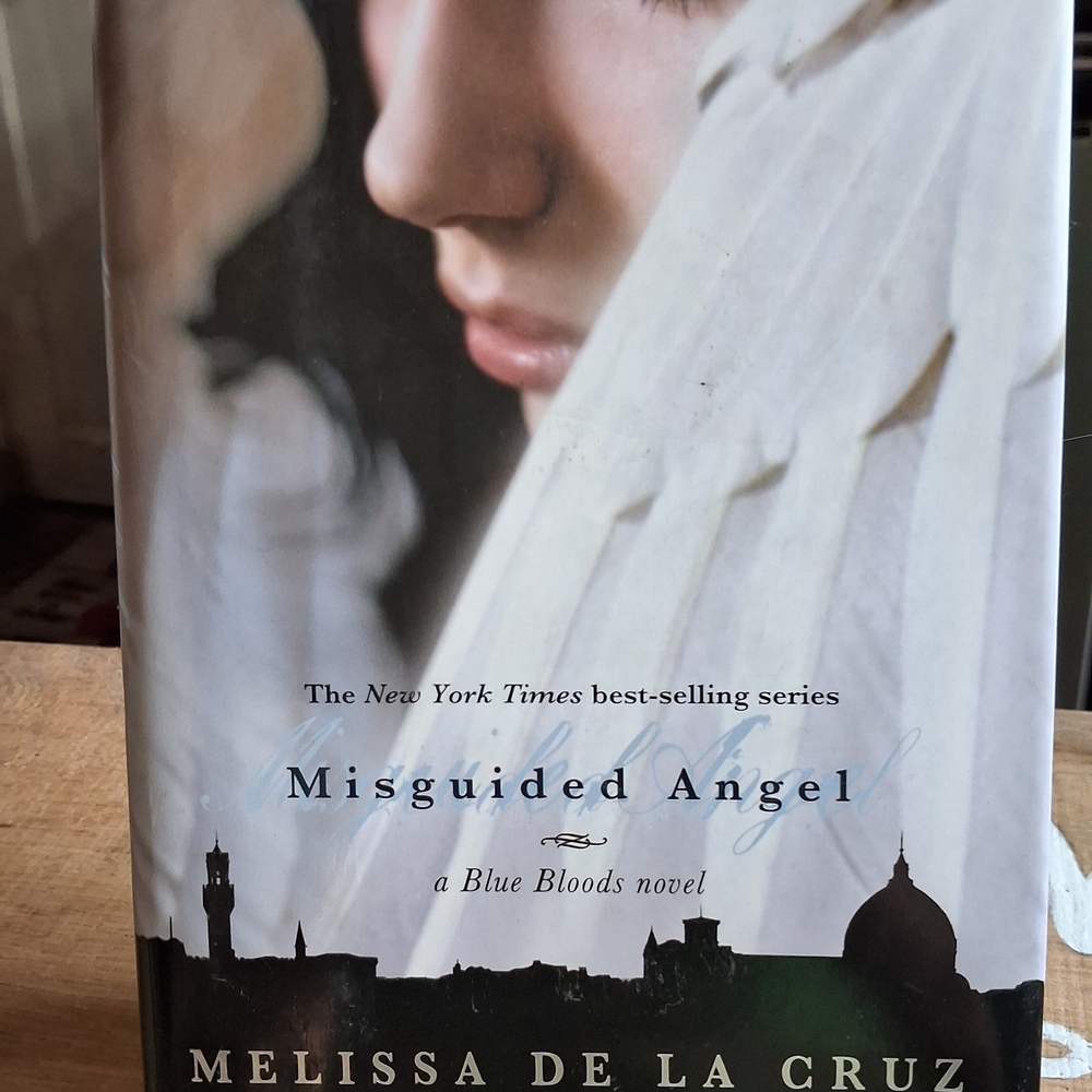 Misguided Angel by Melissa de la Cruz - Elegant White Cover